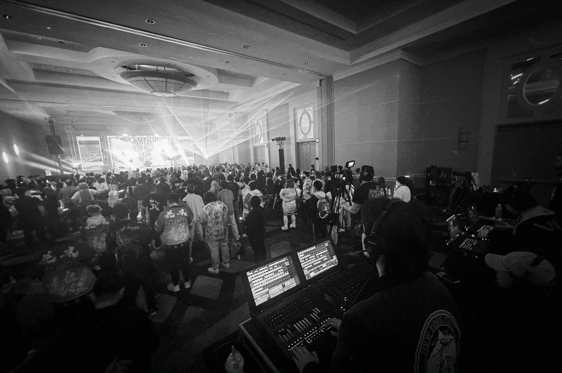 A complete monochrome crowd photograph from Anime Otapia 2026